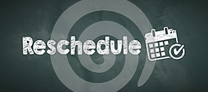 Blackboard with message RESCHEDULE