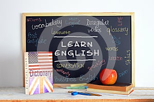 Blackboard and school material in an English class
