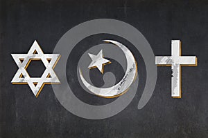 Abrahamic religion symbols drawn on a blackboard