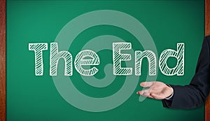 Blackboard with the text The End presenting on blackboard by han