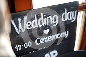 Blackboard with `Wedding day ` words written with white chalk