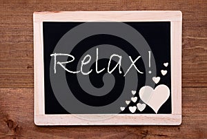 Blackboard With Wooden Hearts, Text Relax