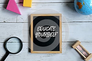 Blackboard written with EDUCATE YOURSELF