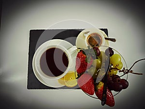 Blackcoffee blackbackground eat fruits tea lemon photo