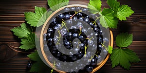 Blackcurrant banner. Bowl full of blackcurrant. Close-up food photography background