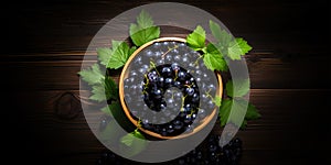Blackcurrant banner. Bowl full of blackcurrant. Close-up food photography background