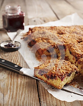 Blackcurrant and hazelnut crumble cake