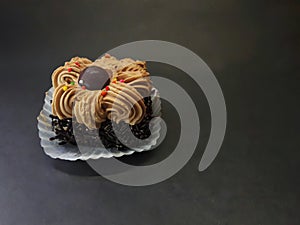 Blackforest cake photo with black background