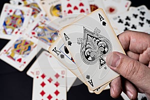 Blackjack game, winning hand. Background with cards lying on the table