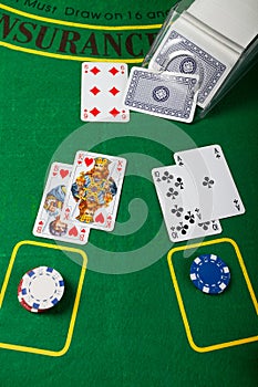 Blackjack hand on green table