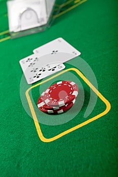 Blackjack hand on green table