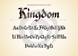 Blackletter gothic script hand-drawn font. photo