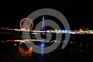Blackpool illuminations with reflection on the beach