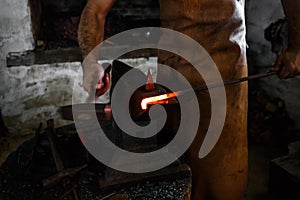 The blacksmith forge the hot metal