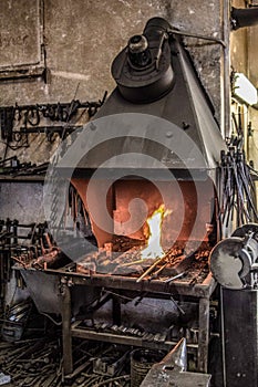 Blacksmith forge oven with fire metal