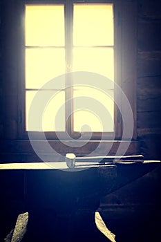 Blacksmith`s hammer on the anvil