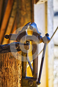 Blacksmith vise in a barn.