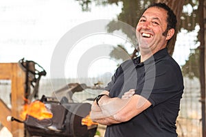 Blacksmith working on the anvil, making a horseshoe.