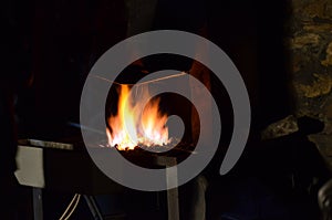 The blacksmith works at night