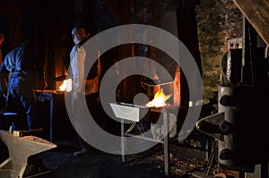The blacksmith works at night
