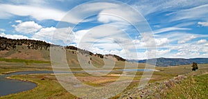 Blacktail Lakes under cirrus lenticular cloudscape in Yellowstone National Park in Wyoming