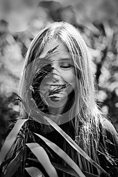 Blackwhite sincerity happiness smile blonde girl in natural background