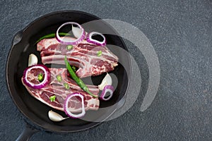 Blade chop and chopped chillies and onions in frying pan