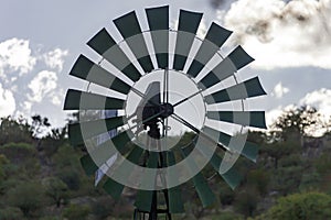 Blades of  wind engine lifting water from well for watering wild animals