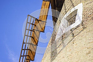 Blades and window details of old windmill