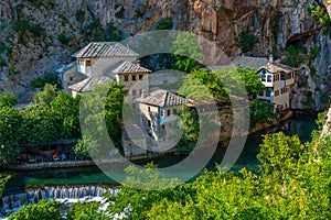 Blagaj Tekke - Historic Sufi monastery built on the cliffs by th photo