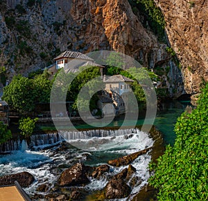 Blagaj Tekke - Historic Sufi monastery built on the cliffs by th photo