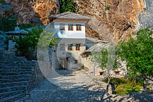 Blagaj Tekke - Historic Sufi monastery built on the cliffs by th photo