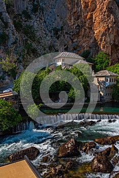 Blagaj Tekke - Historic Sufi monastery built on the cliffs by th photo