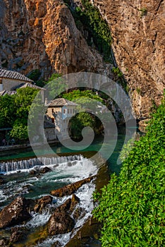 Blagaj Tekke - Historic Sufi monastery built on the cliffs by th photo