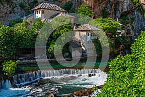 Blagaj Tekke - Historic Sufi monastery built on the cliffs by th photo