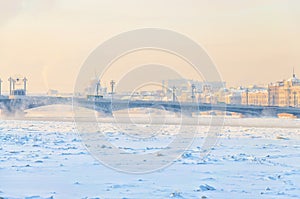 The Blagoveschensky bridge under frosty haze.