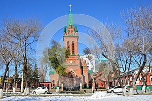 Blagoveshchensk, Russia, October, 21, 2017. Cars are near the Church of the Archangel Gabriel and the other bodiless powers of Hea