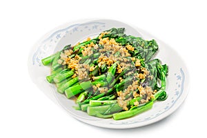 Blanched Chinese Choy Sum vegetable with garlic oil dish photo