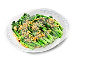 Blanched Chinese Choy Sum vegetable with garlic oil dish photo