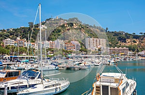 Blanes harbour and view of Sant Joan mountain. Costa Brava, Catalonia, Spain