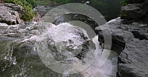 Blangsinga waterfall, Bali. Aerial view of a lush waterfall in a forest