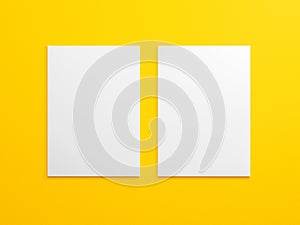 Blank A4 brouchure mock up on bright yellow background texture. Empty realistic white two vertical paper sheet template with