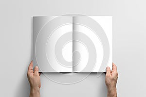 Blank A4 photorealistic brochure magazine mockup on light grey background.