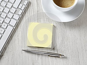 Blank adhesive note on desk