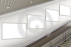 Blank advertising poster on underground escalator wall