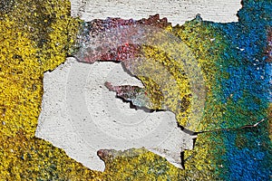 Blank background for your text. The texture of a grunge old street on the facade wall with cracked paint