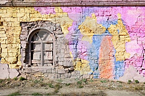 Blank background for your text. The texture of a grunge old street on the facade wall with cracked paint