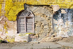 Blank background for your text. The texture of a grunge old street on the facade wall with cracked paint