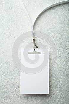 Blank badge with white neckband on white background