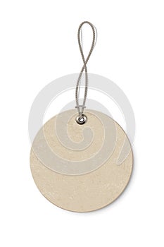 Blank beige round paper price tag isolated on transparent background. Circle shape label with ropes. Cardboard empty